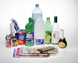 Mixed recyclables including bottles, boxes,tins, paper and jars.