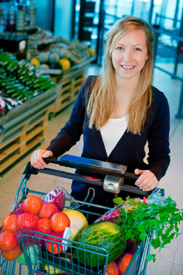 woman pushing a shopping trolley