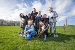 Cllr Wood with pupils and staff of Heage Primary School planting a tree