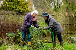 2 people gardening