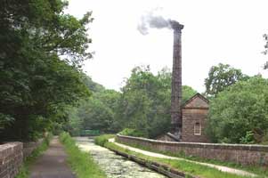 Leawood Pumphouse with smoke coming from chimney