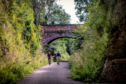 Two people cycling on Clowne Greenway