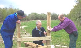 Countryside service volunteers building a stile