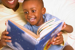 woman with a child reading a book