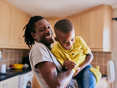 Father and son playing