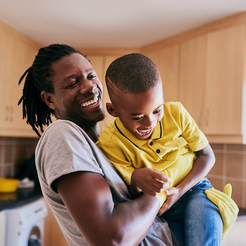 Father and son playing