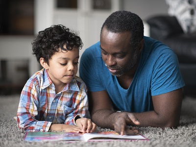 Father and son reading