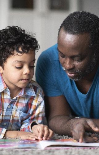 Father and son reading