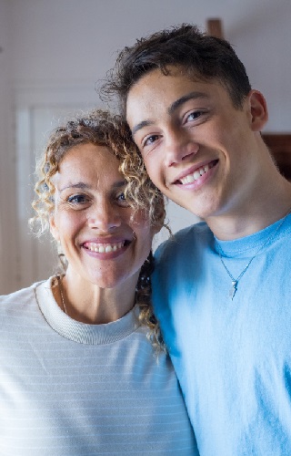 Mother and son smiling