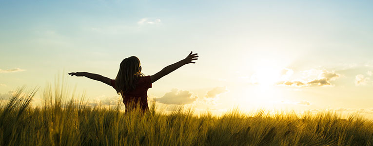 girl in a field of wheat