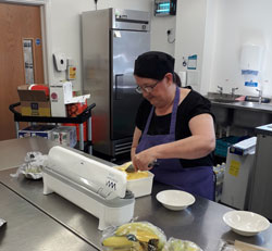 Sadie at her bistro job in Lacemaker Court